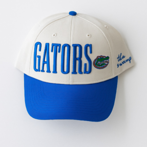 Stay cool with this Florida Gators hat — a cream-and-blue snapback featuring 3D lettering, “Tha Swamp” embroidery, and classic Gator pride.