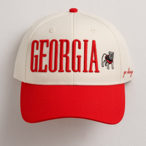 Cream and red Georgia Bulldogs Uga Mascot Hat featuring raised “GEORGIA” embroidery, Uga dog logo, and “go dawgs” stitching.